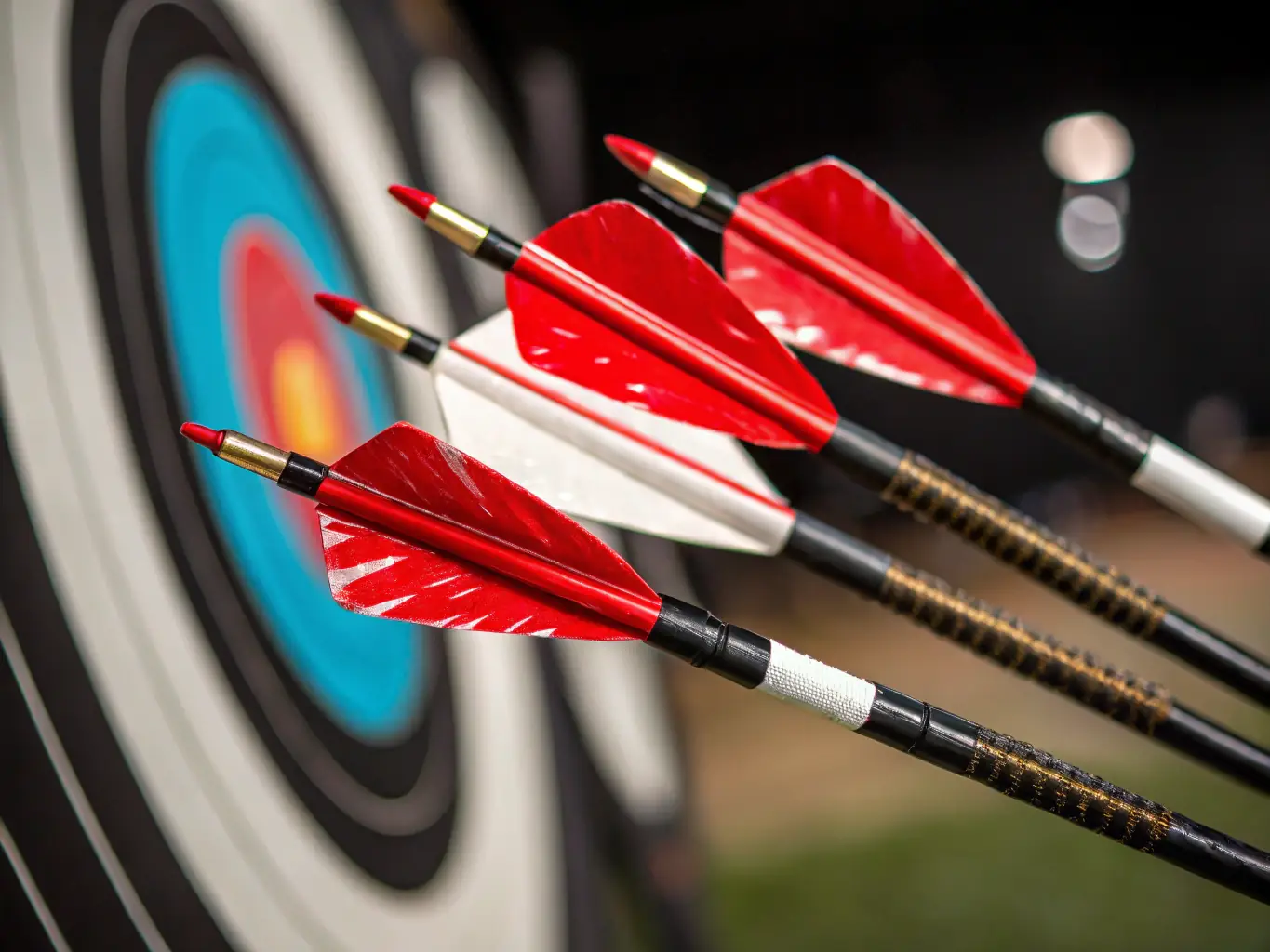 A close-up shot of a Bowtech compound bow and Gold Tip arrows displayed in the archery section of the Denver Weaver's Store.